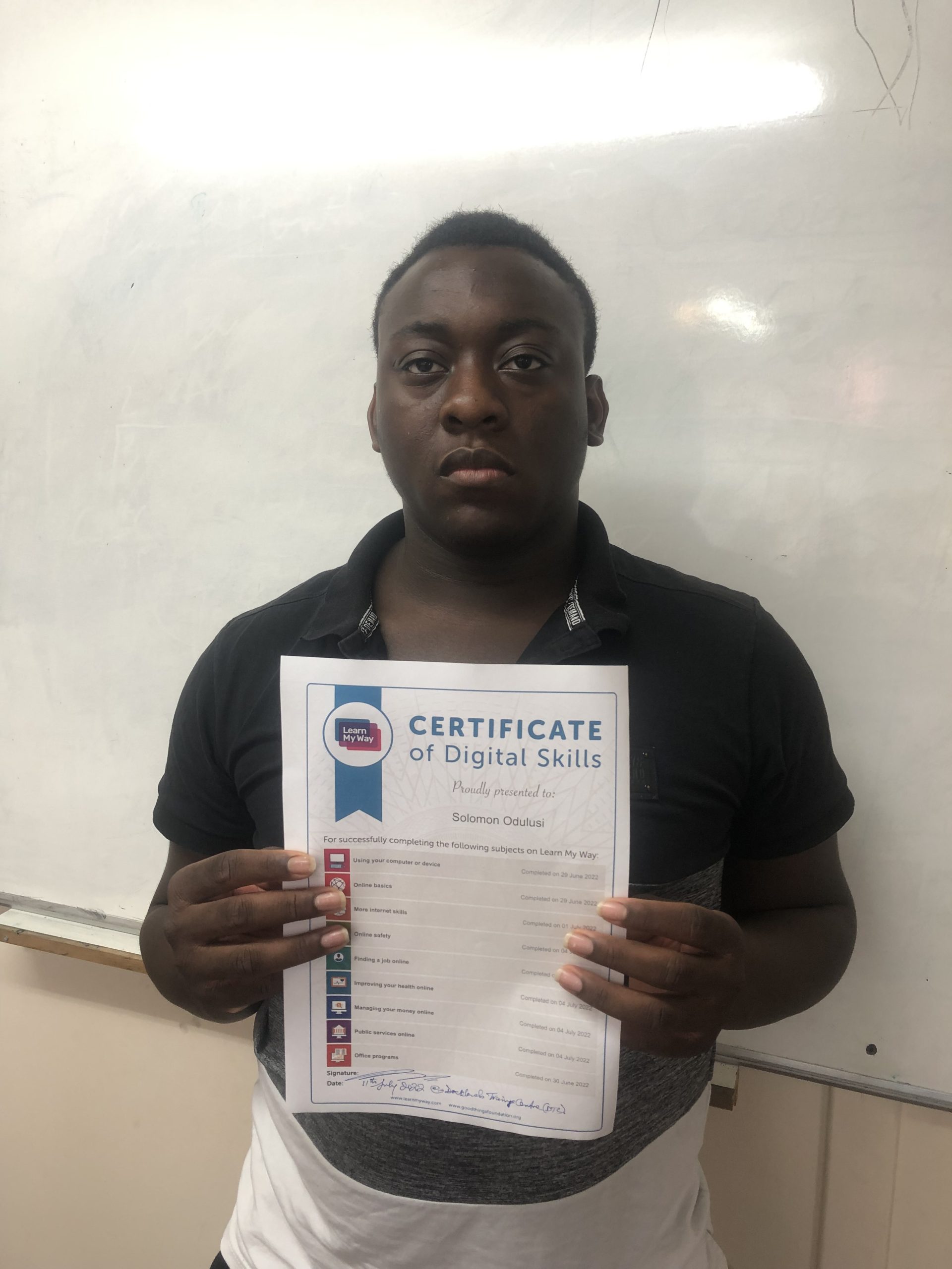 Student with learn my way certificate