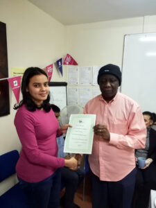 Volunteer receiving award for international volunteer of the year